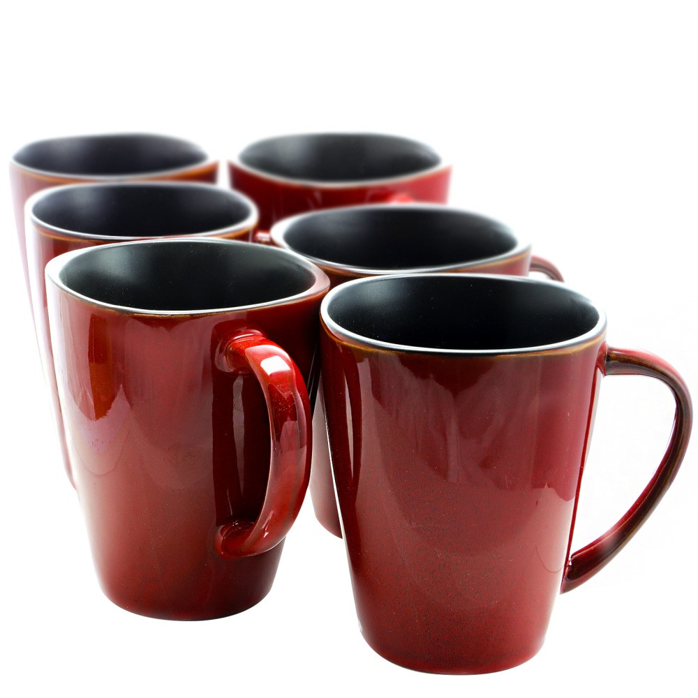 Have your tea or coffee with friends or coworkers with a set of Elama Stoneware Mugs. The set of 6 mugs are safe to use in the microwave and clean in the dishwasher.  Crafted from stoneware for durability.  Microwave-safe design lets you reheat coffee or tea with ease.  Dishwasher-safe for quick cleanup.  Set of 6 large and luxe dinner mugs with a glossy red finish.