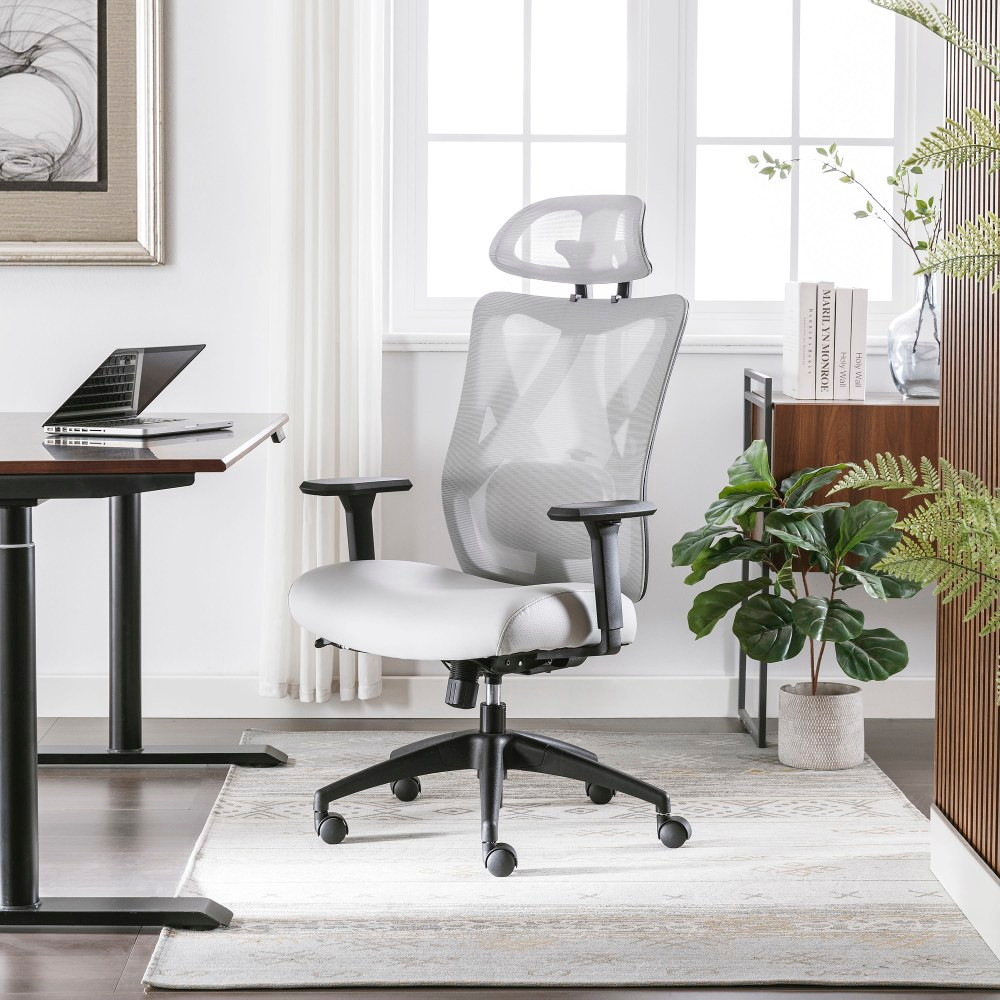 Make a lasting impact on your workspace with the Serta SitTrue Ridgefield Task Chair. This modern high-back chair features an articulating headrest and an adjustable lumbar pad for customized support. The SitTrue seat cushion meets your comfort needs with pocket coils and memory foam. Made of over 50% recycled materials, this Serta office chair is perfect for anyone looking to reduce their environmental footprint without sacrificing ergonomic support.  Upholstered in breathable mesh on the back and polyurethane on the seat.  Height-adjustable and swiveling headrest.  Height-adjustable arm with solid polyurethane arm pads.  Lumbar adjusts in and out and up and down to allow for greater customization.  Ergonomic synchro mechanism with seat side adjustments.  Durable casters for smooth and easy mobility.  GREENGUARD certified - certified for low chemical emissions: UL.COM/GG - UL 2818. Ranked in two tiers: Certified and Gold.  Tested to meet ANSI/BIFMA Performance Standards - Manufacturer testing has been conducted on this product to meet specific performance requirements and safety standards set forth by the American National Standards Institute (ANSI) and the Business and Institutional Furniture Manufacturers.  Less harsh chemicals - made with fewer harsh chemicals, or safer chemicals than typical alternatives, helping  reduce your use of and exposure to substances that may be more harmful to your health and the environment.  Contains Recycled Content - See Specs for Details.  Vegan Leather is a synthetic material containing no animal by-products.  See specs for details.