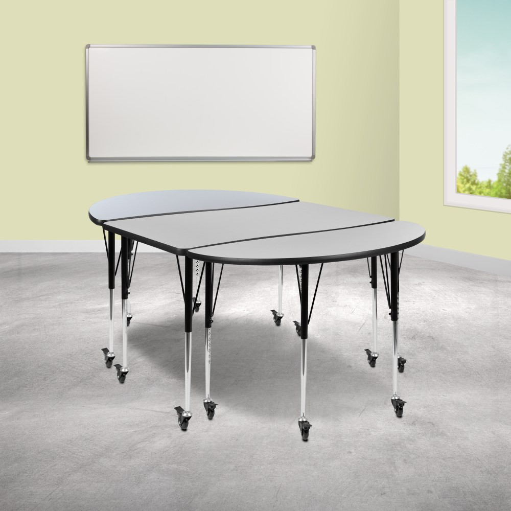 Create a special space for classroom learning with the Flash Furniture Mobile Oval Wave Flexible Thermal Laminate 3-Piece Activity Table Set With Standard Height Adjustable Legs. The table set offers rectangle and half circle tables, each of which are height adjustable. The thick laminate surface resists scratches and stains to look great after years of use.  16 gauge tubular steel legs adjust in 1in increments and feature powder-coated upper legs and chrome lower legs.  1in-thick, thermal-fused laminate top with a protective edge band and scratch and stain resistance.  Casters lock in place.  Recommended for 1st Grade classrooms and up.  Can accommodate up to 6 children or adults.  Includes rectangle and half circle tables.  Backed by the manufacturers 2-year limited warranty.  This product is heavy and/or oversized and may need more than one person to handle.