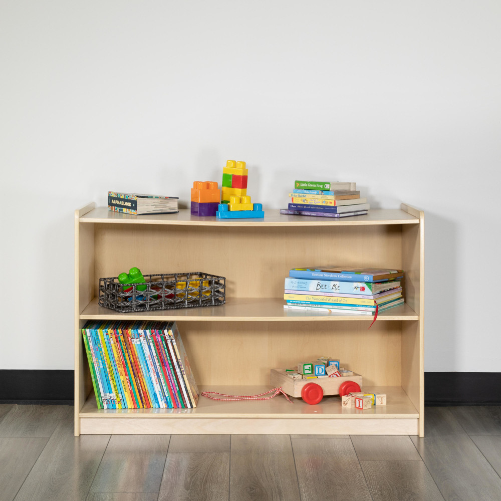 Keep toys, books and more organized with the Flash Furniture Wooden School Classroom Storage Cabinet. The unit is made of durable engineered wood and features a safety-conscious design with an anti-tip strap. The fixed compartments offer multiple storage spaces.  Engineered wood construction.  Fixed storage compartments.  Kid-friendly design features rounded edges and an anti-tip strap.  Weight capacity tested to support 50 lb.  Assembly required.  Backed by the manufacturers 2-year limited warranty.