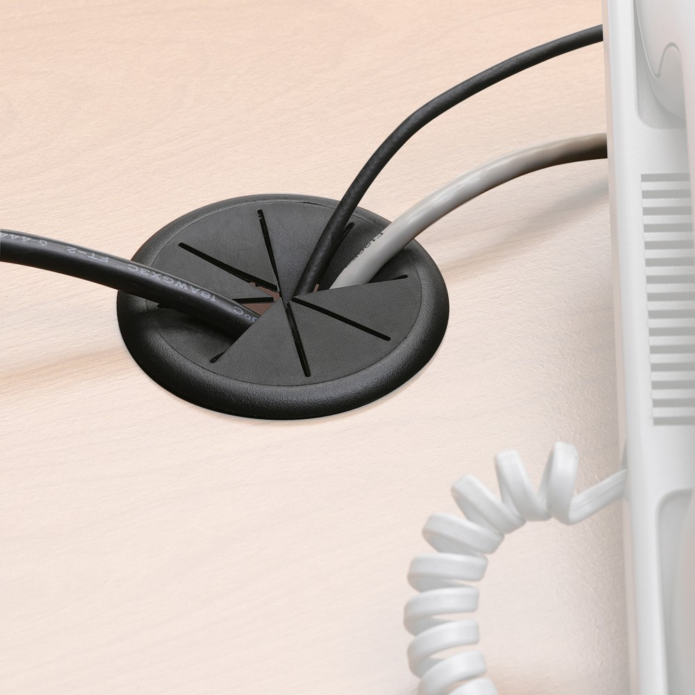 Feed wires away from desktops with an adjustable grommet!  Helps keep your work areas neat and organized.  Flexible grommet accepts wires from any direction.