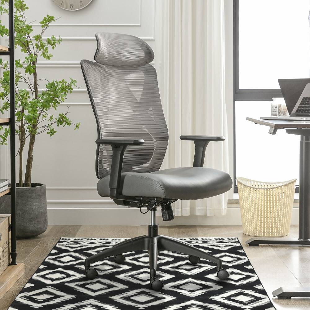 Make a lasting impact on your workspace with the Serta SitTrue Ridgefield Task Chair. This modern high-back chair features an articulating headrest and an adjustable lumbar pad for customized support. The SitTrue seat cushion meets your comfort needs with pocket coils and memory foam. Made of over 50% recycled materials, this Serta office chair is perfect for anyone looking to reduce their environmental footprint without sacrificing ergonomic support.  Upholstered in breathable mesh on the back and polyurethane on the seat.  Height-adjustable and swiveling headrest.  Height-adjustable arm with solid polyurethane arm pads.  Lumbar adjusts in and out and up and down to allow for greater customization.  Ergonomic synchro mechanism with seat side adjustments.  Durable casters for smooth and easy mobility.  Backed by the manufacturers 5-year limited warranty.  GREENGUARD certified - certified for low chemical emissions: UL.COM/GG - UL 2818. Ranked in two tiers: Certified and Gold.  Tested to meet ANSI/BIFMA Performance Standards - Manufacturer testing has been conducted on this product to meet specific performance requirements and safety standards set forth by the American National Standards Institute (ANSI) and the Business and Institutional Furniture Manufacturers.  Less harsh chemicals - made with fewer harsh chemicals, or safer chemicals than typical alternatives, helping  reduce your use of and exposure to substances that may be more harmful to your health and the environment.  Contains Recycled Content - See Specs for Details.  Vegan Leather is a synthetic material containing no animal by-products.  See specs for details.
