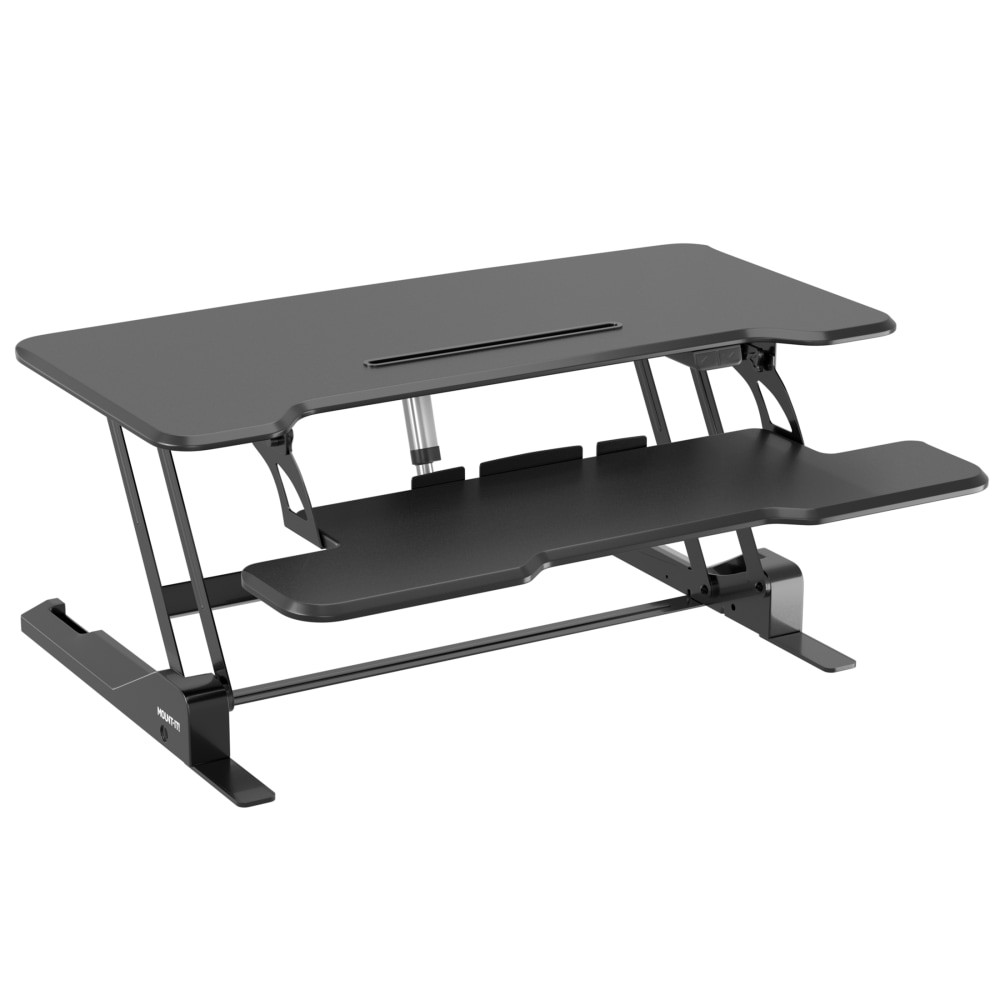 Set this desk converter on your computer desk to sit or stand during the workday. The standing desk offers an electric motor to raise or lower the platform quietly. The unit is made of steel and features a wide keyboard tray to let you keep a keyboard and mouse on hand.  Turn your traditional desk into an active sit-stand workstation with this motorized standing desk converter  High quality, contemporary design with rounded edges fits perfectly into any office or home interior  Quiet and convenient electric height adjustment between 5.9in and 19.3in - scissor design rises straight up  The built-in device slot allows you to keep your tablet or smartphone in sight  Large 38in wide platform provides enough space for two monitors or one monitor and one laptop  Wide keyboard tray holds a large keyboard and provides space for a mouse pad  Supported by Limited Lifetime Warranty