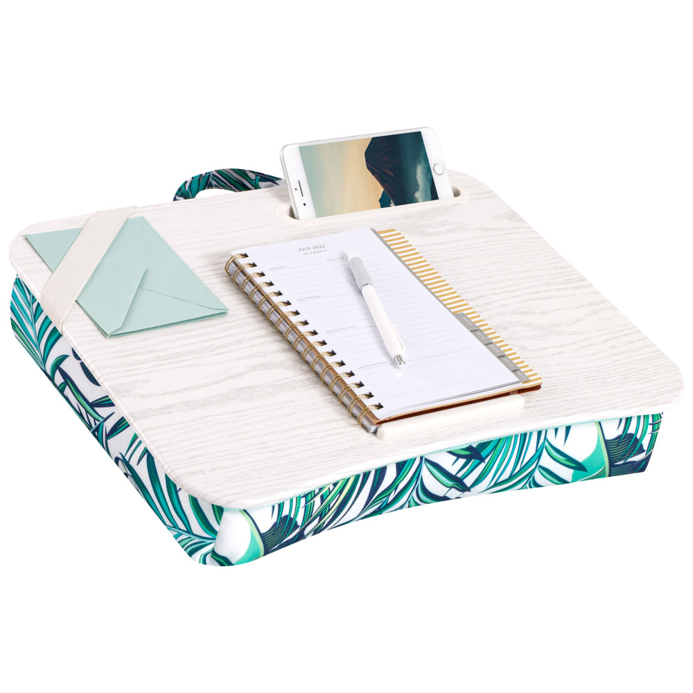 Comfortably work in your favorite easy chair, bed or on the couch with this lap desk. The stylish lap desk combines a fashionable fabric pillow on the bottom with a polished wood-inspired tray for an Instagram-worthy piece.  Designed to hold a laptop up to 15.6in.  Keep your phone at the ready in the phone holder.  Device ledge helps keep your tablet, laptop or phone from sliding off the desk.  Pillow cushion is filled with microbeads to provide comfort while you work.  Polished wood-inspired tray adds a stylish touch.  Backed by the manufacturers 90-day limited warranty.