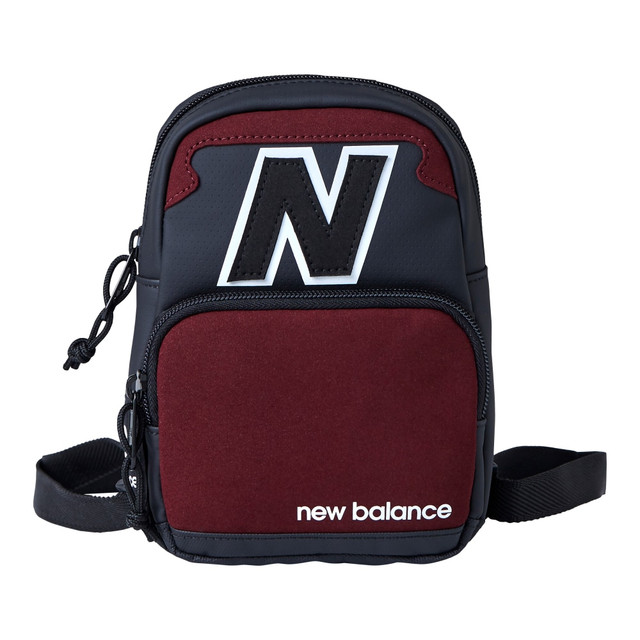 USPA ACCESSORIES LLC New Balance LAB23029-006  Legacy Micro Backpack, 7-1/8inH x 16-15/16inW x 2-1/4inD, Black/Red