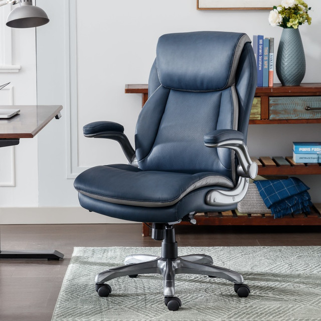 It's about balance in the workplace nowadays-and the Serta Smart Layers Brinkley Executive Chair brings that and more. With a perfect mix of comfort and performance, this Serta office chair features 5 layers of foam with individually wrapped ComfortCoils for pressure point relief and temperature control during extended use. An ergonomic design with lumbar support and a waterfall seat cushion mean this high-back chair provides all-day comfort. Because when the job's not cushy, the chair better be.  Upholstered in durable bonded leather with matching PVC.  Stylish and durable sculpted, flip-up arms with soft pads allow you to work close to the desk.  Seat side cable actuated paddle height & lockout adjustments.  Stylish painted nylon base.  Oversized casters for easier and smoother mobility.  Supports up to 275 lb.  GREENGUARD certified - certified for low chemical emissions: UL.COM/GG - UL 2818. Ranked in two tiers: Certified and Gold.  Tested to meet ANSI/BIFMA Performance Standards - Manufacturer testing has been conducted on this product to meet specific performance requirements and safety standards set forth by the American National Standards Institute (ANSI) and the Business and Institutional Furniture Manufacturers.  Less harsh chemicals - made with fewer harsh chemicals, or safer chemicals than typical alternatives, helping  reduce your use of and exposure to substances that may be more harmful to your health and the environment.