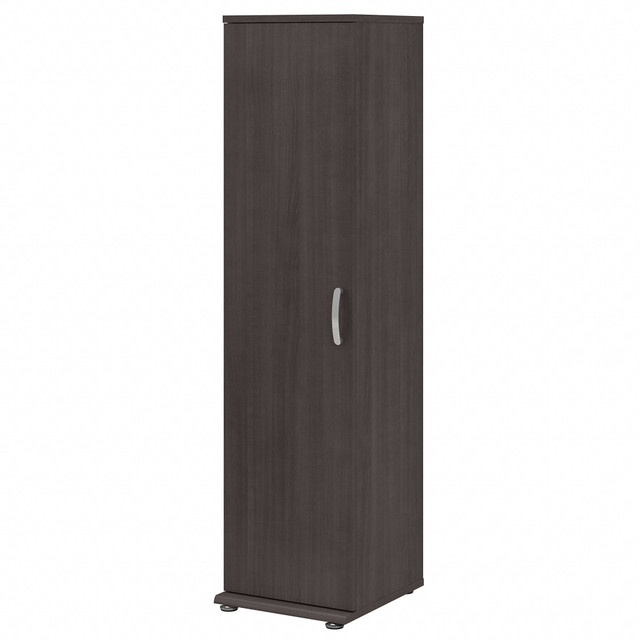The Universal Tall Narrow Storage Cabinet with Door features a commercial-quality design and contemporary styling that suits virtually any home or professional environment. Organize an office, break room, garage, laundry room or another work or living space with a tall skinny cabinet thats built to last and comes in 3 attractive finish options.  Versatile Tall Narrow Storage Cabinet with Door and Shelves is a great way to organize any home or professional space.  Slim cabinet contains 1 fixed shelf and 2 adjustable shelves for flexible storage  Cabinet door features smooth Euro-style hinges for an effortless open and close.  Utility cabinets base includes adjustable levelers to compensate for uneven flooring.  Commercial-quality design can endure years of use as a break room or office storage cabinet, garage cabinet, laundry room cabinet and more.  Wall attachment hardware is included for family-friendly safety and security.  Weight capacity tested to support 35 lb per shelf.  Backed by the Bush Furniture 10-Year Manufacturers Warranty. For additional information, please visit http://www.bushfurniture.com/ReturnsExchanges.aspx  Assembly required.  Standard Delivery Service. Furniture is delivered unassembled.  Assembled Dimensions: 15-2/3inW x 17-1/5inD x 61-4/5inH.  This product is heavy and/or oversized and may need more than one person to handle.