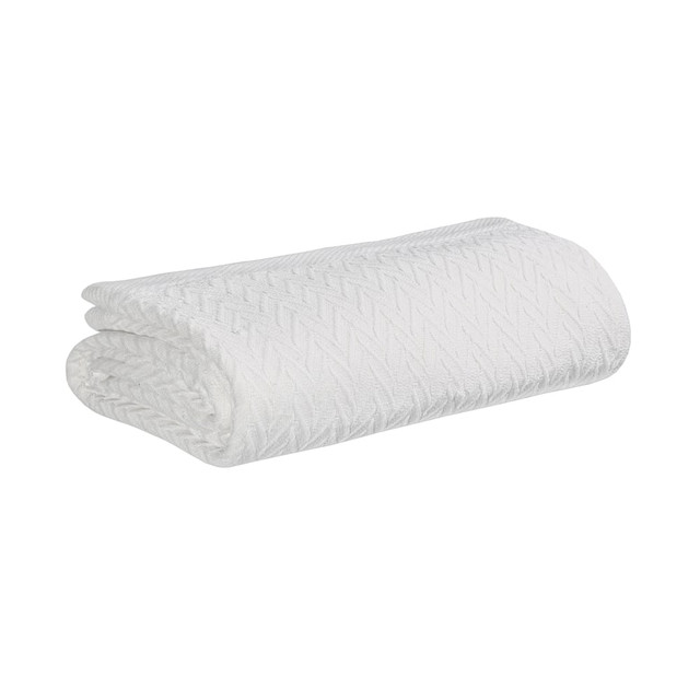 Enjoy the luxurious feel of the 1888 Mills Magnificence Blanket. This thermal blanket provides warmth and a classic look that complements your bedding collection.  Thermal blanket lends a warm, cozy feel.  Made of 100% cotton for softness.  Knit herringbone pattern creates a classic look.  White blanket fits most full-size beds.  This product is heavy and/or oversized and may need more than one person to handle.