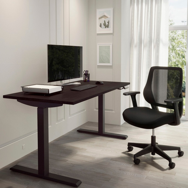 Give your office workspace a contemporary look with this Realspace Magellan Performance electric desk. The powder-coated steel legs hold this desk steady, while the scratch-resistant surface provides added durability. A built-in power station conveniently charges your laptop or phone. This Realspace Magellan Performance electric desk features an adjustable height for use while standing or sitting and electric push buttons for intuitive operation and effortless control.  Steel frame offers sturdy support.  Processed wood with a laminate finish.  Electric buttons for easy operation.  Medium desk for office or home use.  Sit/Stand desk with built-in power station is great for gaming.  Assembly required.  Espresso finish.  ANSI/BIFMA Compliant - This product has been tested and verified for compliance with rigorous performance requirements and safety standards related to specific furniture products.  This product is heavy and/or oversized and may need more than one person to handle.  Interested in in-home assembly? Please call our certified and insured professional assemblers 866-388-4350 today!