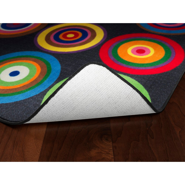 Whether you are teaching an interactive lesson or having a show-and-tell day, a rug can help you in the classroom. This colorful rug features plenty of rings, so each child can find their seating spot for the days activity.  Nylon construction creates a soft spot for students to sit.  Colorful rings allow you to make a fun seating chart.  Dry clean or vacuum for simple maintenance.  This product is heavy and/or oversized and may need more than one person to handle.