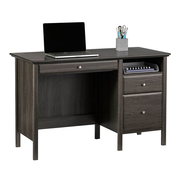 Showcase sophisticated style with this Realspace Chase writing desk. A simple silhouette pairs with contemporary drawer pulls to create a professional look, and the open cubby keeps your tablet or phone within easy reach. The file, box and pencil drawers let you sort paperwork and store supplies for quick access as you work. This Realspace Chase writing desk features a large desktop to accommodate your laptop and peripherals.  Open cubby adds convenient shelf space.  Pencil, box and file drawers provide storage for supplies and paperwork.  Straight legs and clean lines offer modern appeal.  Assembly required.  Finished in coastal gray.  Tested to meet ANSI/BIFMA Performance Standards - Manufacturer testing has been conducted on this product to meet specific performance requirements and safety standards set forth by the American National Standards Institute (ANSI) and the Business and Institutional Furniture Manufacturers.  This product is heavy and/or oversized and may need more than one person to handle.  Interested in in-home assembly? Please call our certified and insured professional assemblers 866-388-4350 today!