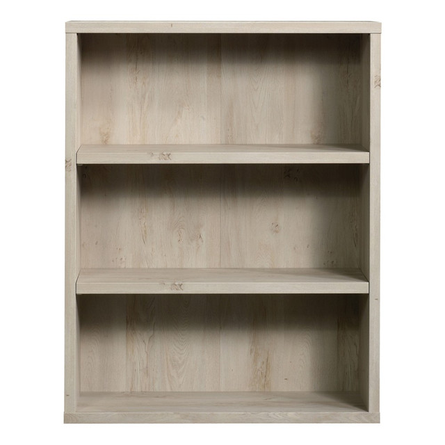 Create a contemporary space with the help of this Sauder Optimum bookcase, which features a wide panel wrap construction. Its perfect for displaying books, framed photos and other decorative items.  Configure your space using adaptable pieces to help  you get organized.  Engineered wood construction with a laminate finish features a wide panel wrap design for less deflection in the shelves.  Smooth edges and lines deliver a contemporary appearance.  High-quality textured finish offers a touch of style.  Made in the USA.  Weight capacity tested to support 25 lb on the adjustable shelves and 35 lb on the fixed shelves and bottom shelf.  Assembly required.  3 shelves, including 2 adjustable shelves, offer plenty of space for your favorite items.  Interested in in-home assembly? Please call our certified and insured professional assemblers 866-388-4350 today!