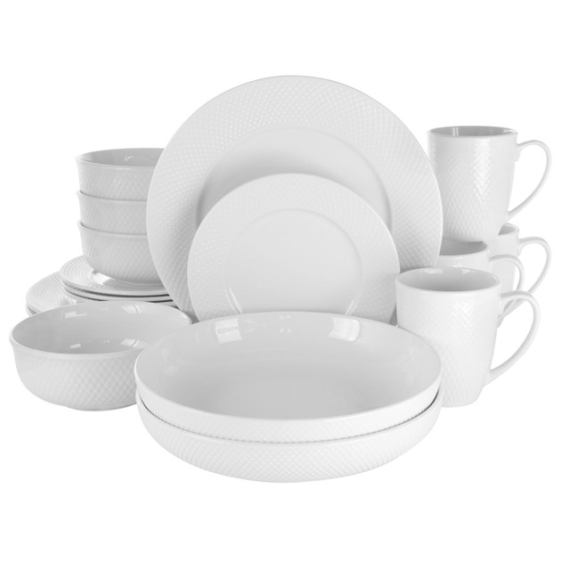 Enjoy a delicious meal with friends and family with help from the Elama Maisy 18-Piece Round Porcelain Dinnerware Set. These pieces are made of porcelain with a glossy finish, and the set comes with bowls, mugs and plates.  Made of strong and durable porcelain.  Glossy finish to add a nice touch.  Microwave and dishwasher safe.  Includes four 10-3/4in dinner plates, four 7-1/2in dessert plates, four 6-1/4in bowls that can hold 16 oz, two 9-1/2in serving bowls that can hold 20 oz and four 10 oz mugs.