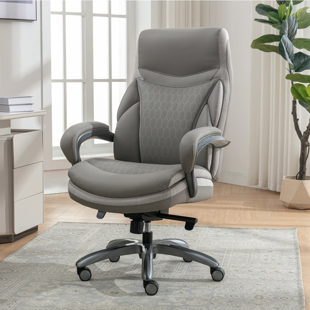 Work in comfort with the Shaquille O-Neal Maximos Ergonomic Bonded Leather Big & Tall Executive Office Chair. This big and tall chair is upholstered in faux leather and features a multi-padded SHAQComfort seat cushion for lasting comfort, while the 360 deg. dual-wheel casters and swivel seat ensure smooth action. The height adjustable chair also features a knee-tilt mechanism for reduced leg tension.  Ergonomic design.  Recommended use of 8 to 10 hours.  Weight capacity tested to support 275 lb.  Overall dimensions: 49-1/4inH x 29-1/2inW x 31-3/4inD.  High back office chair.  Multi-padded SHAQComfort seat cushion.  Faux leather upholstery.  Knee-tilt mechanism.  Variable height adjustments.  360 deg. dual-wheel casters and smooth swivel seat.  Assembly required.  Backed  GREENGUARD certified - certified for low chemical emissions: UL.COM/GG - UL 2818. Ranked in two tiers: Certified and Gold.  Forest Stewardship Council (FSC) certified - made from wood/paper that comes from forests managed to rigorous environmental and social standards, supported by the worlds leading conservation organizations.  Tested to meet ANSI/BIFMA Performance Standards - Manufacturer testing has been conducted on this product to meet specific performance requirements and safety standards set forth by the American National Standards Institute (ANSI) and the Business and Institutional Furniture Manufacturers.  ANSI/BIFMA Compliant - This product has been tested and verified for compliance with rigorous performance requirements and safety standards related to specific furniture products.  Leadership forestry - from forests or sourcing programs that meet specific environmental standards, helping you support practices that better protect forests and the environment.  Less harsh chemicals - made with fewer harsh chemicals, or safer chemicals than typical alternatives, helping  reduce your use of and exposure to substances that may be more harmful to your health and the environment.  Faux Leather is a synthetic material. See specs for details.