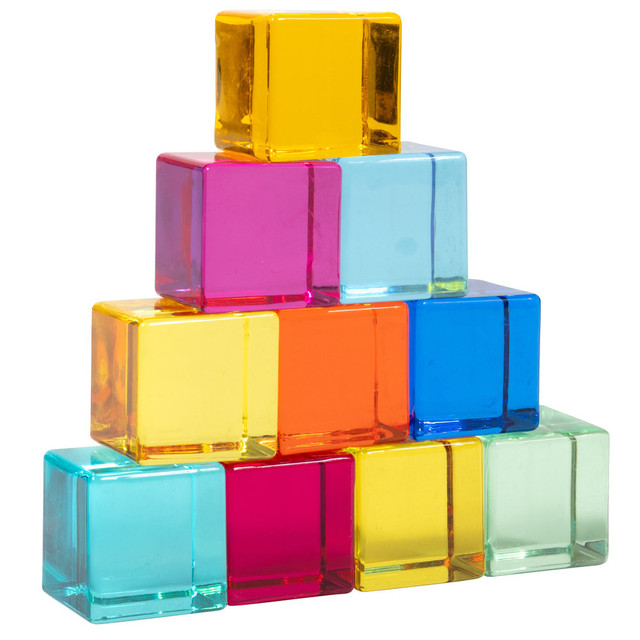 This set features 10 translucent gem cubes in different colors of the rainbow. Explore creative play and early learning activities with these colorful manipulatives.  Explore creative construction, counting and color-mixing activities with these colorful manipulatives.  Stack, balance, count and create patterns with these colorful gems.  Investigate color mixing and cast shadows.  Use them in the sunlight or on a light panel!  These chunky cubes are finished with smooth edges that are perfect for small hands.  They are also lightweight and easy to clean.  Made with durable, polished acrylic, this set is designed to last for years of classroom or home use.  Keep kids engaged with fascinating colors and lights.  They also make satisfying sounds when tumbled together.  Promote calm concentration in sensory stations and calming corners.  For ages 10m+.Size of cubes: 1in.
