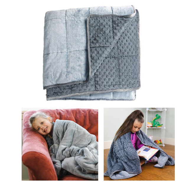 Help kids relax in class with the Bouncyband Kids Sensory Weighted Dual Texture Shoulder Wrap. This weighted shoulder wrap applies gentle deep pressure to the shoulders and upper back to relieve anxiety.  Weighted shoulder wrap is a sensory tool that applies gentle deep pressure comfort to shoulders and upper back to relieve anxiety and improve focus.  Soothing dual textures include soft fleece nubs on 1 side and silky-smooth plush on the other.  Can lay across the shoulders and upper back horizontally while sitting, or rested across lap or stomach.  Clean with a damp cloth or sponge using soapy water or mild detergent and air dry.