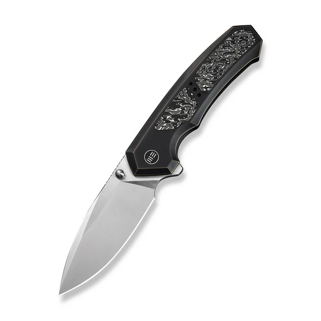 We Knife WE24088-3 Corwyn Flipper & Thumb Stud Knife Bronze & Black Titanium Handle With Aluminum Foil Carbon Fiber Inlay (3.7"" Satin Finished Bohler M390 Blade) We Knife WE24088-3 Corwyn Flipper & Thumb Stud Knife Bronze & Black Titanium Handle With Aluminum Foil Carbon Fiber Inlay (3.7"" Satin Finished Bohler M390 Blade)