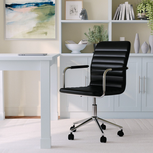You can start on a productive workday by taking a seat in this executive office chair. The Martha Stewart swivel chair rolls to help you move about your space. The faux leather upholstered chair is soft and stylish, and the seat can move up or down as needed.  Modern office chair features simple elegance for any home office  Contemporary style upholstered office chair  Upholstery accented armrests  Polished metal frame with dual wheel casters  Pneumatic height adjustable 360 deg. swivel seat  Built-In Lumbar Support  Maximum static weight capacity: 300 lbs.  Wipe clean with a dry cloth  Backed by the manufacturers 2-year limited warranty.  Faux Leather is a synthetic material. See specs for details.