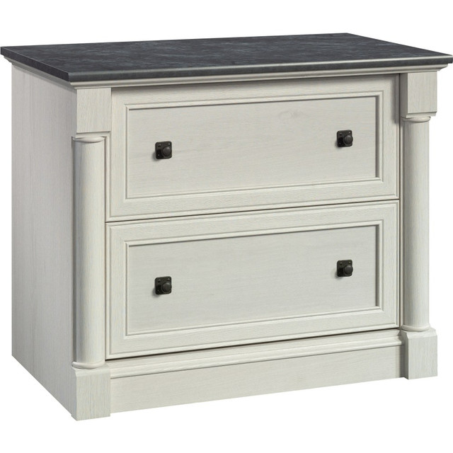 Store letter-, legal- and European-size files in this lateral file cabinet, which features 2 drawers with full-extension slides. The unit is made of sturdy engineered wood, which looks stylish and holds up over time.  Engineered wood file cabinet.  2-drawer file cabinet with full-extension slides.  Shelf offers a spot to display trophies, awards and picture frames.  Interlocking safety mechanism allows 1 drawer to be open at a time.  Weight capacity tested to support 40 lb per drawer  Assembly required.  This product is heavy and/or oversized and may need more than one person to handle.