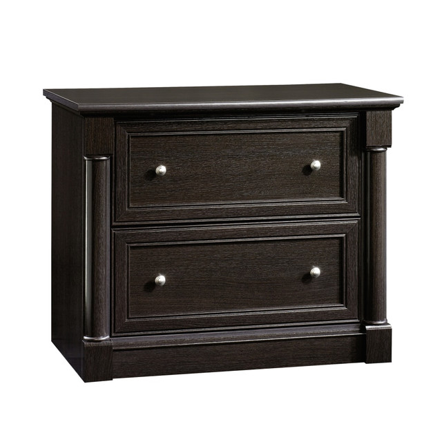 Store letter-, legal- and European-size files in this lateral file cabinet, which features 2 drawers with full-extension slides. The unit is made of sturdy engineered wood, which looks stylish and holds up over time.  Engineered wood file cabinet.  2-drawer file cabinet with full-extension slides.  Shelf offers a spot to display trophies, awards and picture frames.  Interlocking safety mechanism allows 1 drawer to be open at a time.  Weight capacity tested to support 40 lb per drawer  Assembly required.  This product is heavy and/or oversized and may need more than one person to handle.