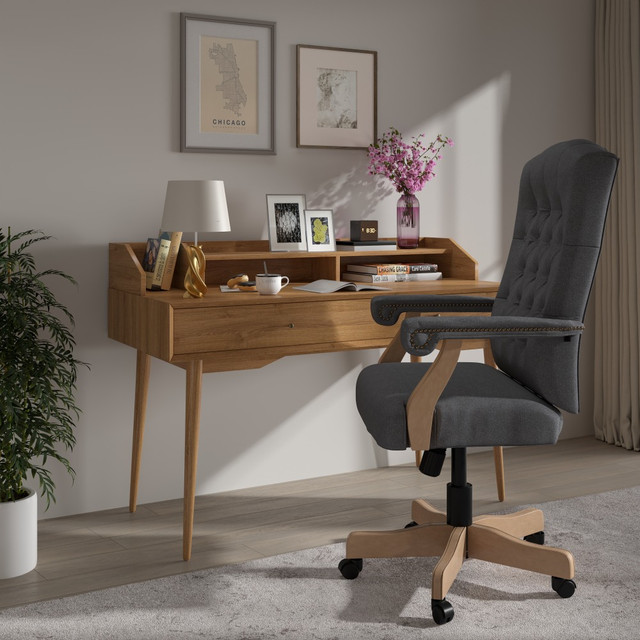 Use this high-back chair to handle your workload in style. The fabric-upholstered chair provides a soft feel and features thick padding to cushion your body. The swivel chair offers a tilt mechanism and dual-wheel casters, helping you find the right spot at your workstation.  Traditional Office Chair with Brass Nail Accented Scroll Arms  High Back Design with Button Tufting  Tilt Lock Mechanism rocks/tilts the chair and locks in an upright position  Tilt Tension Adjustment Knob adjusts the chairs backward tilt resistance  High Density Thick Padding with CAL 117 Fire Retardant Foam  360 Degree Swivel Seat with Pneumatic Seat Height Adjustment  5-Star Wood Capped Metal Base with Dual-Wheel Casters  Backed by the manufacturers 1-year limited warranty.