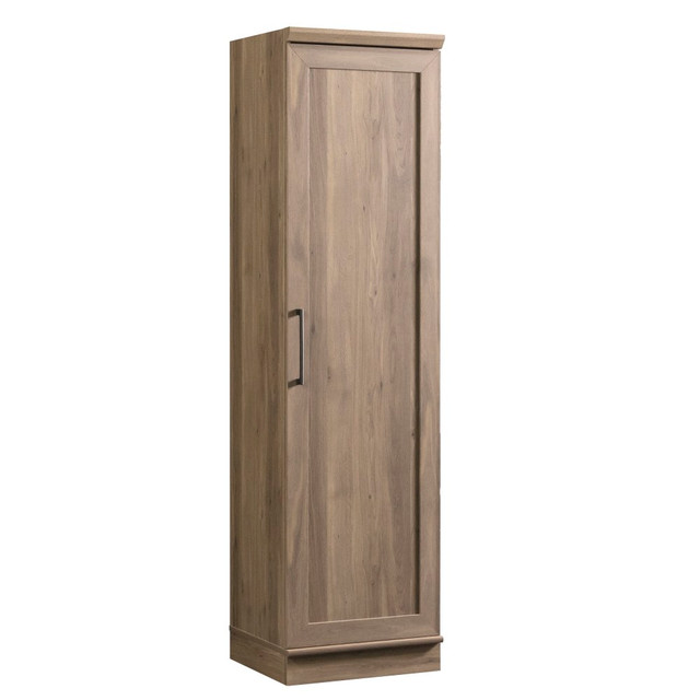 Keep your home organized with a Sauder HomePlus 19inW Single Door Pantry Cabinet. Utilize fixed and adjustable shelves to store and organize a variety of essentials. This kitchen cabinet boasts a reversible door that opens to the left or right for versatile placement.  Durable engineered wood construction with metal hardware.  Storage cabinet boasts 3 adjustable shelves and 2 fixed shelves.  Reversible door opens to the left or right.  Adjustable base levelers offer stability.  Assembly required.  This product is heavy and/or oversized and may need more than one person to handle.