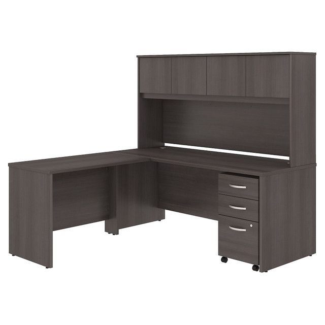 Choose the Studio C L Shaped Desk with Hutch for a classic commercial-grade design that works with you for years and a contemporary finish that looks great in the modern office. The Hutch conveniently stores supplies, books and more, while the Mobile File Cabinet rolls with you throughout your office or remains in place as needed on any surface.  Bundle includes: 72inW x 30inD Office Desk, 42inW Desk Return, 72inW Hutch, 3 Drawer Mobile File Cabinet.  Assembled Dimensions: 71inW x 71inD x 65 6/7inH  Thermally fused laminate finish fends off scratches and stains to protect the office furniture set.  L Shaped Desk surface offers space to spread out and integrated cable management to conceal computer cords.  Return attaches to either side of Desk to form a left or right-handed L Shaped layout for your comfort.  Desktop weight capacity tested to support 200 lb.  4 Hutch doors provide plenty of storage room and include self-closing Euro-style hinges.  Mobile File Cabinet locks to secure your letter, legal and A4 size paperwork with a file drawer gliding on smooth full-extension ball-bearing slides.  Mobile File Cabinet includes 2 box drawers with 1 file drawer and rolls wherever you need it.  File drawer weight capacity tested to support 37 lb.  Available in your choice of several contemporary and traditional finishes to fit any work environment.  Commercial quality backed by the Bush Business Furniture 10-Year Manufacturers Warranty. For additional information, please visit: www.bushbusinessfurniture.com/ReturnsExchanges  Assembly Required.  Standard Delivery Service. Furniture is delivered unassembled.  Tested to meet ANSI/BIFMA Performance Standards - Manufacturer testing has been conducted on this product to meet specific performance requirements and safety standards set forth by the American National Standards Institute (ANSI) and the Business and Institutional Furniture Manufacturers.  This product is heavy and/or oversized and may need more than one person to handle.