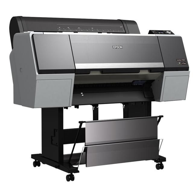 Create incredible imagery at larger sizes with the Epson SureColor P7000 Large Format Printer. Connecting with ease to any work station, this printer produces photos, artworks and commercial proofs at up to 24in wide, using 11 ink, 10 color configuration for true-to-life colors that resist fading for many years to come.  Print stunning large-format photographic prints, fine art imagery and commercial documents at up to 24in wide.  Up to 2880 x 1440 dpi resolution for crisp, clear, accurate images.  UltraChrome HDX archival pigment ink uses an 11 ink, 10 color configuration to deliver exceptional, precise colors and deepest blacks.  Advanced PrecisionCore TFP 10 channel, drop-on-demand printhead with 360 nozzles per color channel.  Ink-repelling coating technology gives smooth, quality results.  Color photographs are fade-resistant for up to 200 years, black and white photographic prints resist fading for up to 400 years.  Variable droplet technology delivers 3 different droplet sizes, as small as 3.5 picoliters, per line for incredible accuracy.  Epson ESC/P raster photographic drivers ensure accurate results.  Delivers 40in x 60in prints in approximately 24 minutes 20 seconds.  Compatible with a variety of media, delivering border-free prints on 10in, 11.8in, 13in, 16in, 17in, 20.3in, 23in and 24in paper widths.  User-adjustable roll media adapters accept 2in and 3in core diameters.  High-speed internal rotary cutter for automatic or manual cutting of finished prints.  Connects to your PC or Mac through Gigabit Ethernet and USB 2.0 interfaces for ease-of-use.  Backed by the manufacturers 1 year limited warranty.  ENERGY STAR certified - meets federal guidelines for energy efficiency.  This product is heavy and/or oversized and may need more than one person to handle.  Energy efficient - designed to use less energy than alternative products, potentially helping you save money and reduce your carbon footprint.