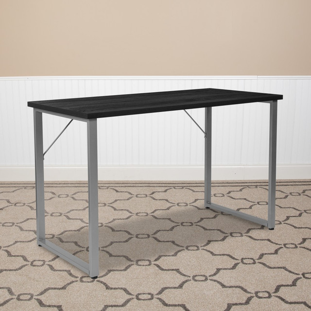 Utilize this handsome computer desk in your home office to create a professional atmosphere. The spacious desktop has plenty of space for your computer, paperwork and office supplies.  Metal sled base frame with adjustable floor glides prevent scrapes to flooring and provide stability on uneven surfaces.  Attractive desktop features a laminate finish for durability.  Large rectangular desktop can easily accommodate your computer and other office essentials.  Small desk - recommended for a small or shared space.  Assembly required.  Tested to meet ANSI/BIFMA Performance Standards - Manufacturer testing has been conducted on this product to meet specific performance requirements and safety standards set forth by the American National Standards Institute (ANSI) and the Business and Institutional Furniture Manufacturers.