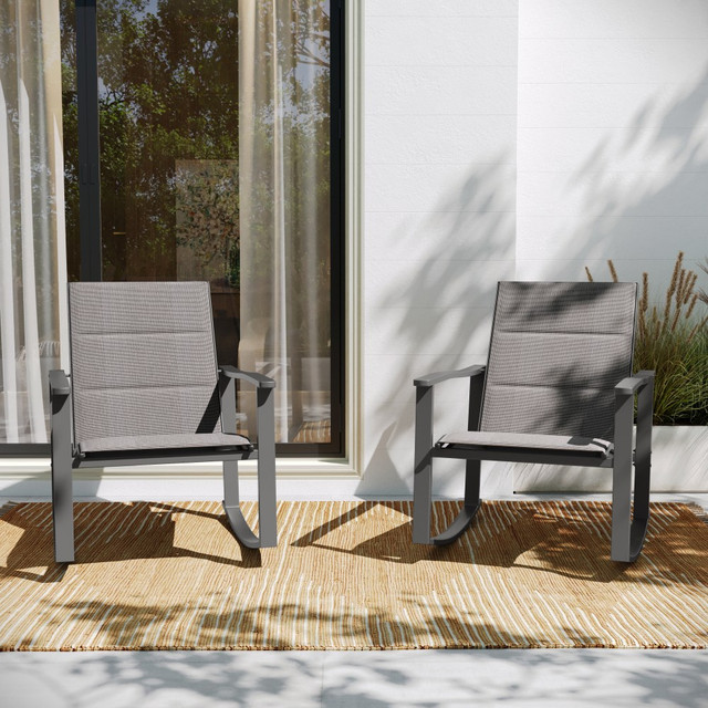 Add the Flash Furniture Brazos Flex Comfort and Metal Outdoor Rocking Chairs to your patio or porch. These outdoor rocking chairs feature steel frames that are weather- and rust-resistant for lasting durability. The Flex comfort textilene fabric on the seats and backs offers comfort and wipes clean easily.  Rocking chairs designed for outdoor use.  Weather- and rust-resistant steel frames provide durability.  Flex comfort textilene fabric on seat and back offers comfort.  Smooth motion curved runners.  Integrated armrests add support.  Weight capacity tested to support 300 lb.  Overall dimensions of each chair: 32inH x 23-3/42inW x 31inD.  Wipe clean with a damp cloth.  Assembly required.  Backed by the manufacturer's 1-year limited warranty.