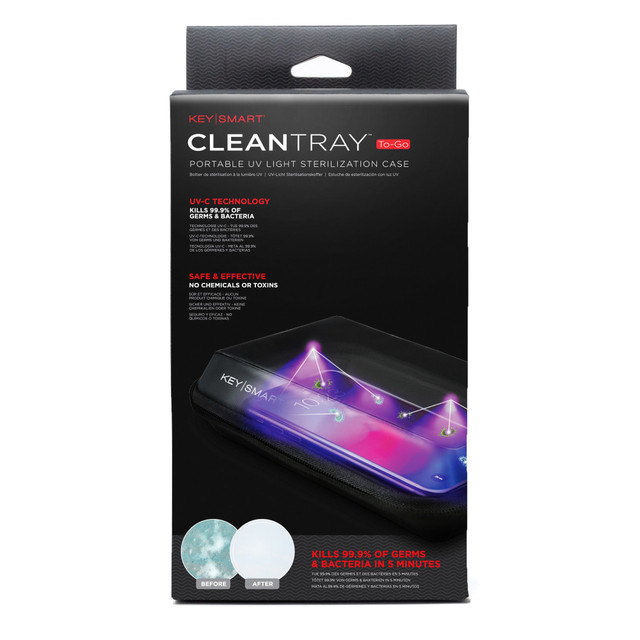 Sanitize your smartphone, wallet and other essentials using this KeySmart CleanTray To-Go Portable UV Light Sterilization Case. Easy to take on the go, this UV sanitizer provides an eco-conscious alternative to chemical sprays and paper cleaning products.  Fits most smartphones up to 7in, as well as other essentials like your keys, wallet and AirPods.  Soft-touch case is made from polyester with a PU lining for lasting use.  Kills 99.9% of germs and bacteria in just 5 minutes.  Delivers up to 75 cycles per charge and up to a 5,000-hour lifespan.  Weighs less than 1 lb for a highly portable design.  Includes a rechargeable battery and charging cable.
