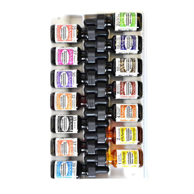 Dropper-stopper bottles come in a storage tray  Includes fourteen 0.5-oz bottles.  Colors include no. 1 lemon yellow, 2 cadmium, 4 yellow ochre, 8 burnt sienna, 10 sepia, 18 ultramarine, 20 Nile green, 25 vermilion, 27 magenta, 30 purple, 32 cadmium orange, 33 black, 37 rose carthame and 39 cerulean blue.
