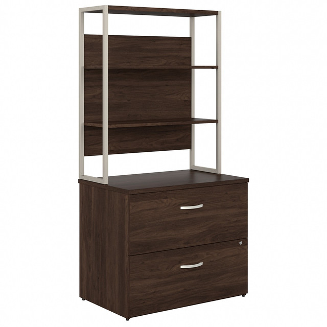 The Hybrid 2-Drawer Lateral File Cabinet with Shelves presents a commercial-quality office storage solution with style that appeals to the modern professional. Organize paperwork, reference materials and more with a bookcase file cabinet.  Bundle includes: 2-Drawer Lateral File Cabinet, 36inW Bookcase Hutch.  File drawers open on smooth full-extension ball bearing slides for an effortless reach to letter-, legal- and A4-size paperwork.  Filing cabinet features a single lock that secures both drawers to protect sensitive information.  Open shelves are perfect for organizing books or brightening up your space with pictures and decorations.  Thoughtfully designed for maximum stability and includes hardware to anchor the Lateral File Cabinet with Shelves to a wall.  Each drawer can hold up to 88 lb of materials while shelves support up to 50 lb each.  Available in your choice of Black Walnut, Modern Hickory, Platinum Gray, Storm Gray and White finish options.  See the full line of Hybrids modern office furniture, including Desks, Storage Cabinets and Mobile File Cabinets.  Backed by a 10-Year Manufacturers Warranty. For additional information, please visit: www.bushbusinessfurniture.com/ReturnsExchanges  Assembly Required.  Standard Delivery Service. Furniture is delivered unassembled.  Tested to meet ANSI/BIFMA Performance Standards - Manufacturer testing has been conducted on this product to meet specific performance requirements and safety standards set forth by the American National Standards Institute (ANSI) and the Business and Institutional Furniture Manufacturers.  This product is heavy and/or oversized and may need more than one person to handle.