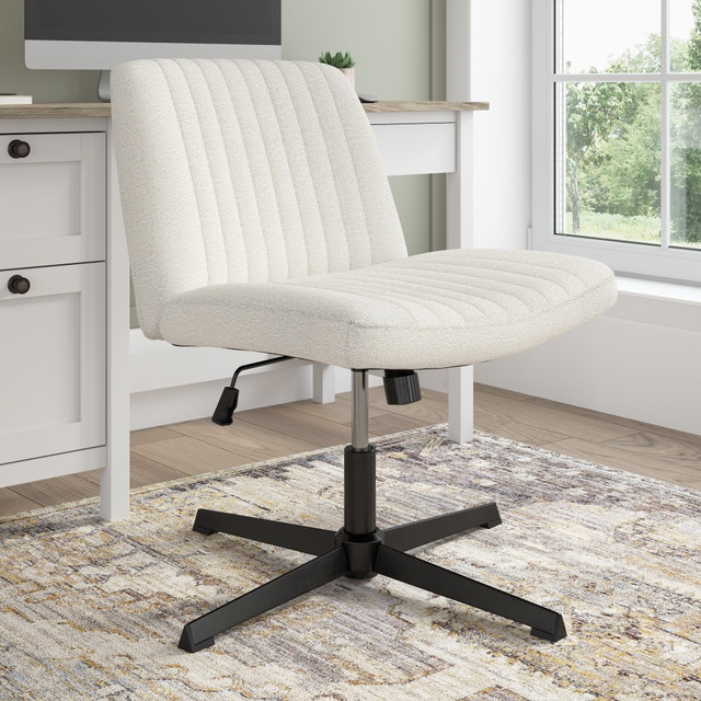 The Bush Furniture Sutton Armless Computer Chair Without Wheels offers a budget-friendly seating solution for a variety of tasks throughout the home. Perfect for pulling up to a small writing table or vanity desk, this home office chair includes a variety of features intended to provide exceptional comfort and functionality.  Versatile desk chair without wheels provides a stylish and affordable seating solution for a variety of living spaces.  Armless design allows users to sit cross-legged and fits conveniently under a table or desk to save space when not in use.  Adjustable chair tilt and tension set the rate and ease of recline  tilt lock sets the chair in an upright position.  Criss cross legged chair is cushioned with high-density memory foam padding to provide comfort while you work.  Sturdy steel base supports the home office chair for a weight capacity of 275 pounds.  Small computer chair includes plastic feet to protect against snagged carpet or scratched floors.  Soft, durable fabric upholstery comes in your choice of three colors to complement your existing furniture.  Rigorously tested to meet or exceed ANSI/BIFMA x5.1 standards for safety and performance.  Backed by the Bush Furniture 5 Year Manufacturers Warranty.  See the full line of Bush Furniture Desk and Storage solutions to build your ideal home office