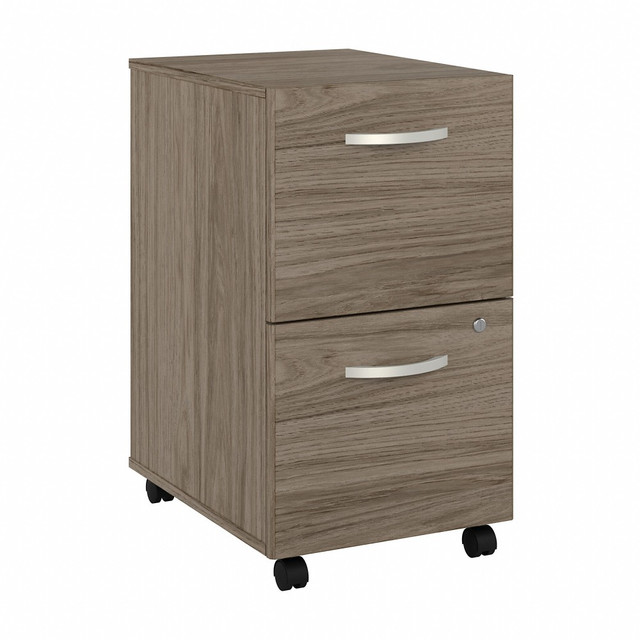 The Studio C Mobile File Cabinet rolls with you throughout your office. Dual-wheeled, hooded casters keep the cabinet moving wherever you want or remain in place on your office floor or carpet. You will have your paperwork organized in no time as the Mobile File Cabinet ships fully assembled.  Assembled Dimensions: 15 5/7inW x 20 1/6inD x 27 7/8inH  Thermally fused laminate finish fends off scratches and stains.  Mobile File Cabinet rolls wherever you need it on two fixed and two swivel casters.  Brushed Nickel hardware complements your choice of several attractive finishes for a contemporary or traditional look.  File drawers glide on smooth full-extension ball-bearing slides so you will easily access all contents.  Cabinet stores letter, legal and A4-size files while locking for your security.  Conveniently fits under coordinating Studio C Desks (sold separately).  Commercial quality backed by the Bush Business Furniture 10 Year Warranty. For additional information, please visit: www.bushbusinessfurniture.com/ReturnsExchanges  Tested to meet ANSI/BIFMA Performance Standards - Manufacturer testing has been conducted on this product to meet specific performance requirements and safety standards set forth by the American National Standards Institute (ANSI) and the Business and Institutional Furniture Manufacturers.