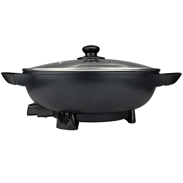 Create a variety of tasty meals with the Brentwood Non-Stick Flat Bottom Electric Wok Skillet. This powerful 1400W electric wok boasts a non-stick cooking surface for easy food release.  Non-stick surface for easy cleanup.  Flat bottom for fast, even heating.  24-cup capacity.  Removable thermostat for ease of use.  Adjustable temperature from 195 deg.F to 450 deg.F.  Cool touch handles help prevent burns.  Vented tempered glass lid.  Backed by the manufacturers 1-year limited warranty.