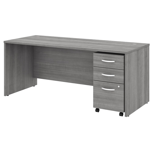 Choose the Studio C Office Desk with Mobile File Cabinet for a durable design that works hard for years and a fresh finish that looks great anywhere. With a thick surface, an extended modesty panel and clean lines, the Office Desk conveys a classic look but adds a contemporary finish to meet the style needs of the modern workspace.  Thermally fused laminate finish fends off scratches and stains to protect the office furniture set.  Office Desk surface offers space to spread out and integrated cable management to conceal computer cords.  Desktop weight capacity tested to support 200 lb.  Mobile File Cabinet locks to secure your letter, legal and A4 size paperwork with a file drawer gliding on smooth full-extension ball-bearing slides.  Mobile File Cabinet includes 2 box drawers with 1 file drawer and rolls wherever you need it.  File drawer weight capacity tested to support 37 lb.  Available in your choice of several contemporary and traditional finishes to fit any work environment.  Brushed Nickel hardware complements the finish.  Commercial quality backed by the Bush Business Furniture 10-Year Manufacturers Warranty. For additional information, please visit: www.bushbusinessfurniture.com/ReturnsExchanges  Bundle includes: 72inW x 30inD Office Desk, 3-Drawer Mobile File Cabinet.  Assembled Dimensions: 71inW x 29-3/8inD x 29-5/6inH.  Standard Delivery Service. Furniture is delivered unassembled.  Assembly Required.  Tested to meet ANSI/BIFMA Performance Standards - Manufacturer testing has been conducted on this product to meet specific performance requirements and safety standards set forth by the American National Standards Institute (ANSI) and the Business and Institutional Furniture Manufacturers.  This product is heavy and/or oversized and may need more than one person to handle.