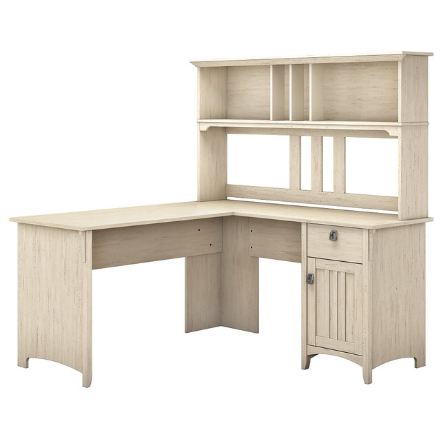 Add a touch of style and comfort to your home office. The Salinas L Shaped Desk with Hutch provides an ideal personal workspace with a large surface area and plenty of room for storage and display. Tapered legs, curved base rails and decorative wood accents inspired by timeless Mission styling look great in your choice of attractive finishes.  Bundle includes: 60inW L Shaped Desk, 60inW Hutch  Assembled Dimensions: 60inW x 60inD x 63inH  Space-saving L Shaped Desk design offers ample workspace and can be placed in a corner.  Work surface weight capacity tested to support 200 lb.  Storage cabinet with adjustable shelf conceals reference materials and miscellaneous items.  Box drawer holds small items such as writing utensils, notepads and other office supplies.  Open storage on Hutch provides plenty of room to display books, photos, decorations and more.  Tapered legs, curved base rails and decorative wood accents inspired by timeless Mission style.  Elegant metal drop pull hardware finished in stylish Tumbled Pewter.  Tested to meet ANSI/SOHO standards for safety and performance.  Assembly Required.  Standard Delivery Service. Furniture is delivered unassembled.  This product is heavy and/or oversized and may need more than one person to handle.