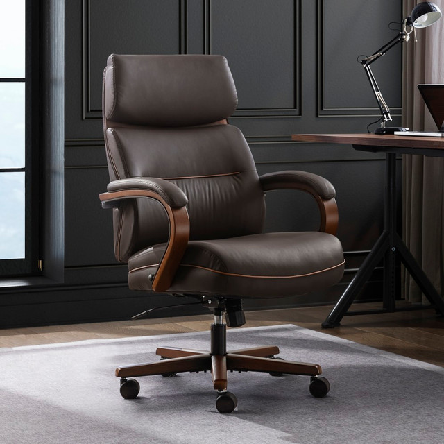 Reach for this executive office chair and get down to business. The vegan leather office chair provides a smooth feel and is cushioned with high-density foam for lasting comfort. The ergonomic chair is height-adjustable and swivels and rolls to maneuver around your space.  Recommended for performance use 6-8 hours per day.  Ergonomic design allows for comfort throughout the day.  Lumbar support.  Waterfall seat.  Soft vegan leather upholstery and tailored double-stitching. High-density foam with a semi-plush seat cushion.  Side lever for height adjustment and tilt lock. Tilts 119 deg..  Swiveling design.  Padded, sloping arms.  Metal base with wood overlays and 360 deg. smooth-rolling casters.  Weight capacity tested to support 275 lb.  Overall dimensions: 41-3/4in - 44-3/4inH x 27inW x 28-1/2inD.  Assembly required.  Includes a hardware kit.  Backed by the manufacturers 1-year limited warranty.  Tested to meet ANSI/BIFMA Performance Standards - Manufacturer testing has been conducted on this product to meet specific performance requirements and safety standards set forth by the American National Standards Institute (ANSI) and the Business and Institutional Furniture Manufacturers.