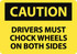 AccuformNMC Sign: Rectangle, "Caution - Drivers Must Chock Wheels on Both Sides" C468RB