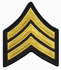 Hero's Pride 15404S Medium 3'' Gold/Black Sergeant Chevrons w/ Merrowed Border