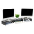 Promote Better Posture with Adjustable Monitor Riser Enhance your workspace ergonomics with this adjustable-length monitor riser, designed to lessen eye and back strain by elevating your monitor or laptop to an optimal viewing level. The riser offers versatility with its flexible configurations, giving you the freedom to extend either side up to a total of 36 inches or leave them unextended to suit different spatial arrangements. Made from robust MDF, this monitor riser can securely support one or two monitors, up to a total weight of 44 lbs. Measuring up to an adjustable 51.25 inches in length, 9.25 inches in width, and 4.75 inches in height, its an invaluable addition to home offices, professional workplaces, dorm rooms, TV or family rooms, and even classrooms.  Ergonomic viewing angle: This monitor riser elevates your monitor or monitors to a comfortable viewing angle, reducing strain on your eyes and neck. By positioning the screen at a more natural level, you can work or watch for longer periods  Adjustable configurations: The risers can be customized, extend both sides to the full width of 51.25 inches, adjust each side individually, or leave both sides unextended. You can leave the riser straight or angle each side in  Stable and sturdy support: Constructed with sturdy MDF material, it can accommodate weights of up to 44lb (20kg), ensuring that your monitors are secure and steady  Versatile addition: Whether you need to enhance your home office, office, dorm room, TV room, or classroom setup, this riser offers exceptional value and functionality. Improve your productivity and create a more organized working environment  Convenient dimensions: With dimensions of 51.25 inches in length, 9.25 inches in width, and 4.75 inches in height (130.18 x 23.50 x 12.07 centimeters) , this riser provides ample space for your monitor or monitors while maintaining a compact profile  Versatile design offers use at home or in the office.