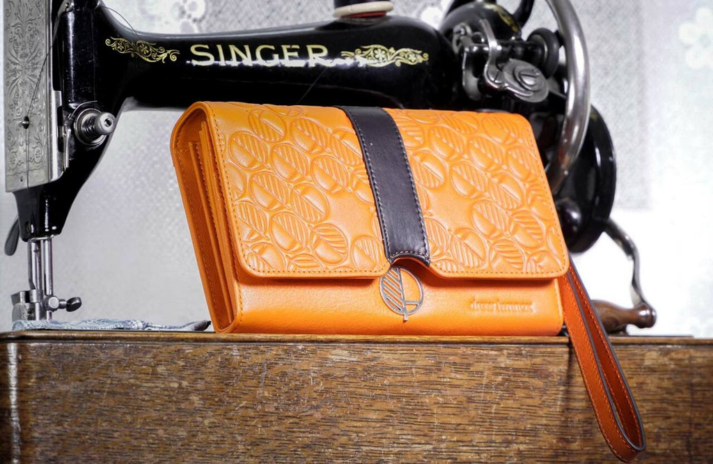 Luxury travel wallet and clutch made from real leather