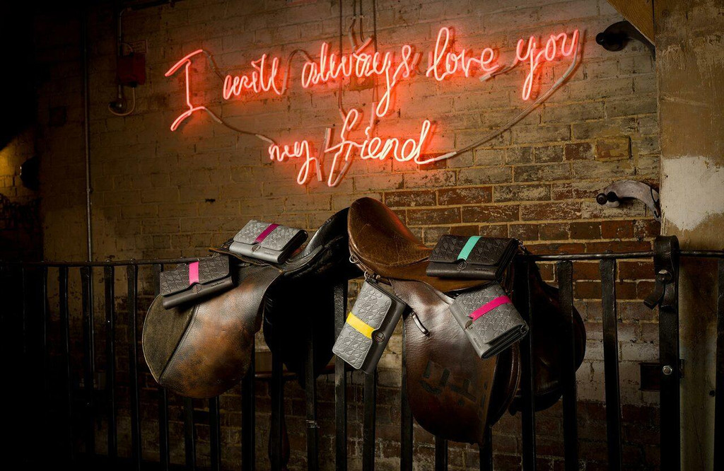 Lightweight leather clutch for hands-free travel