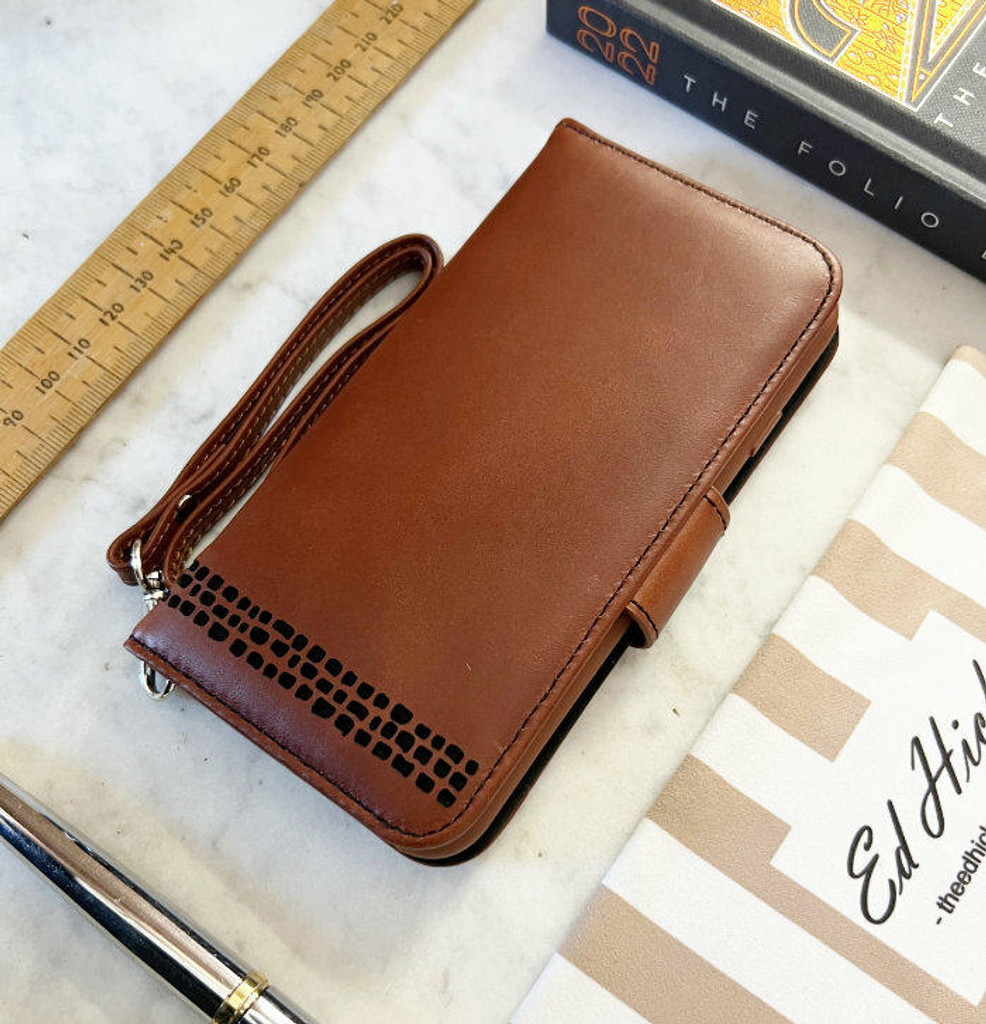 Royale iPhone wallet case showing SIM card slot pocket