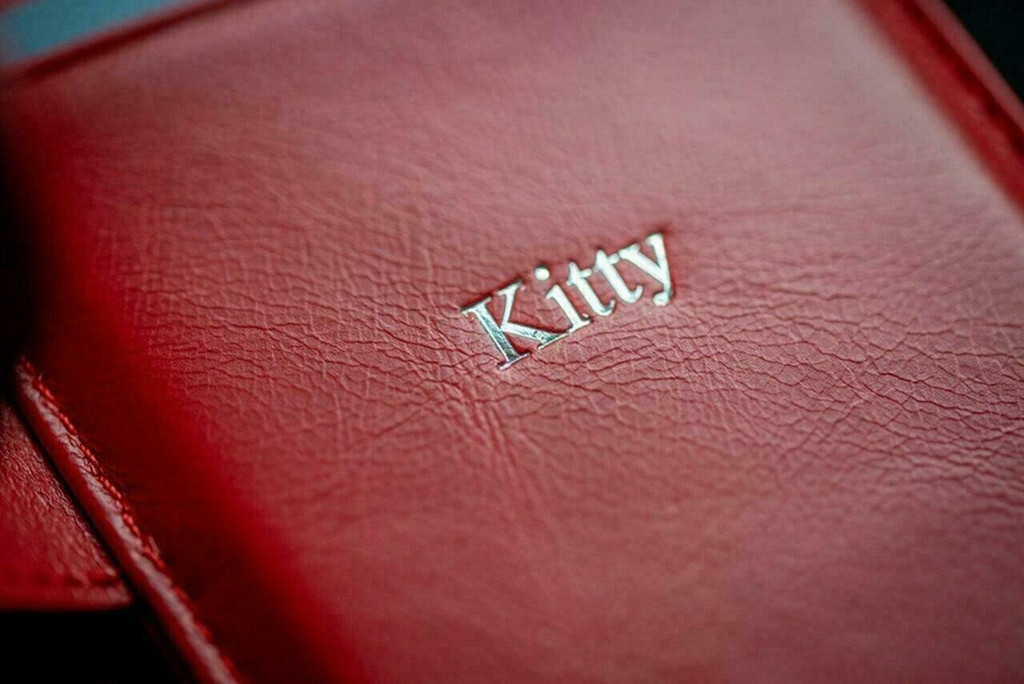 Classic brown leather Royale wallet case close-up