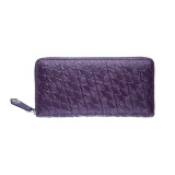Purple leather purse with sleek continental design Purple leather purse with sleek continental design