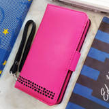 Hand holding the Royale leather wallet case for iPhone XR Hand holding the Royale leather wallet case for iPhone XR