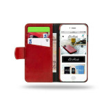 Royale leather wallet case on desk with iPhone 12 inserted