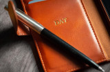 Real leather wallet flip case for iPhone 16 Plus in vintage brown with card slots and magnetic closure